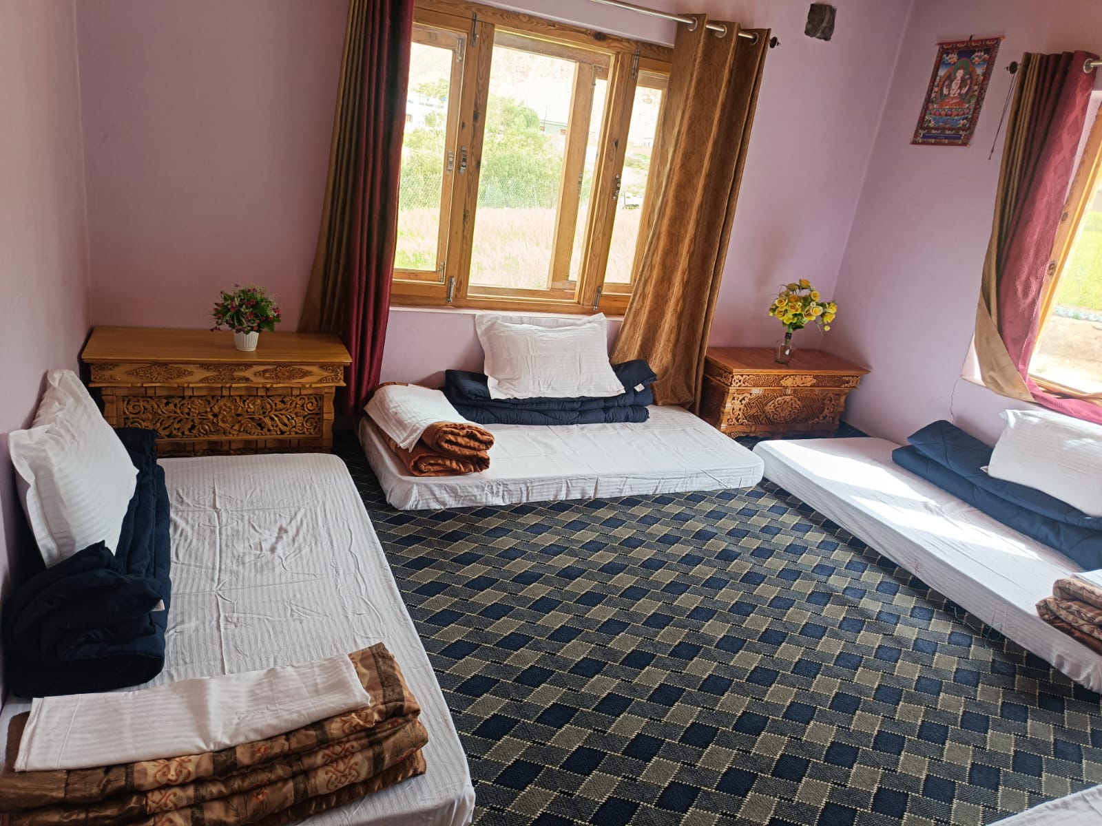 Three beds, three windows, one view of the valley